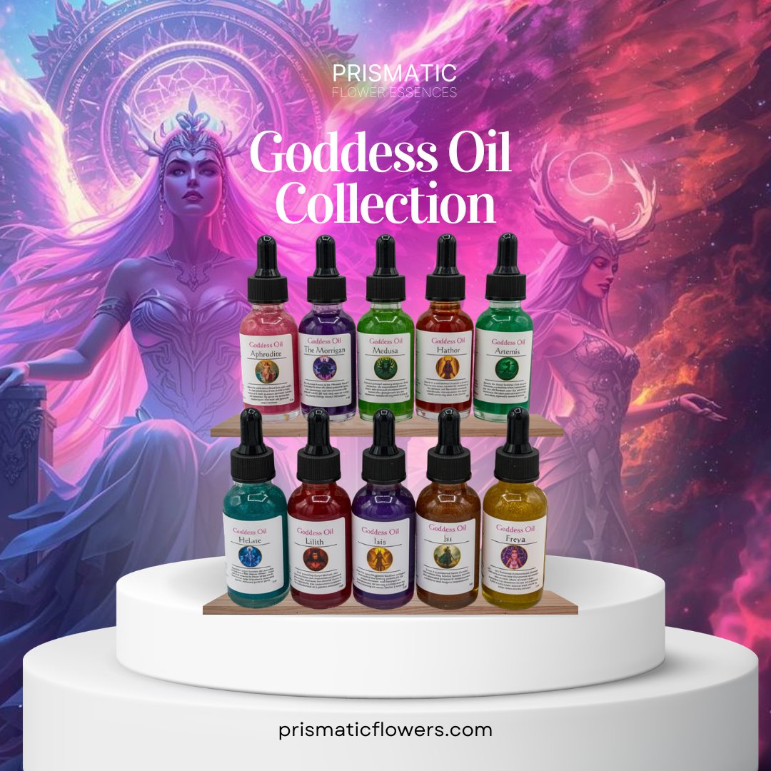 Ten Goddess Oil dropper bottles in red, purple, green, amber, teal and gold glass on two wooden shelves, labelled Aphrodite, The Morrigan, Medusa, Hathor, Artemis, Hekate, Lilith, Isis and Freya, set against pink and violet goddess artwork under the heading Goddess Oil Collection